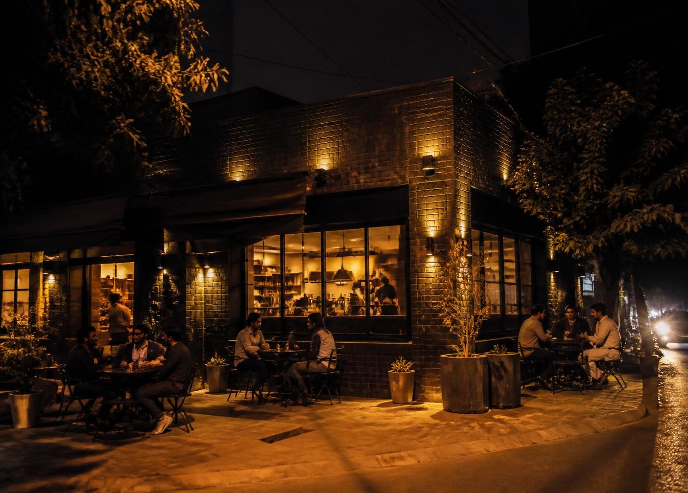 Cafe Cuisine street-side seating in Lahore at night